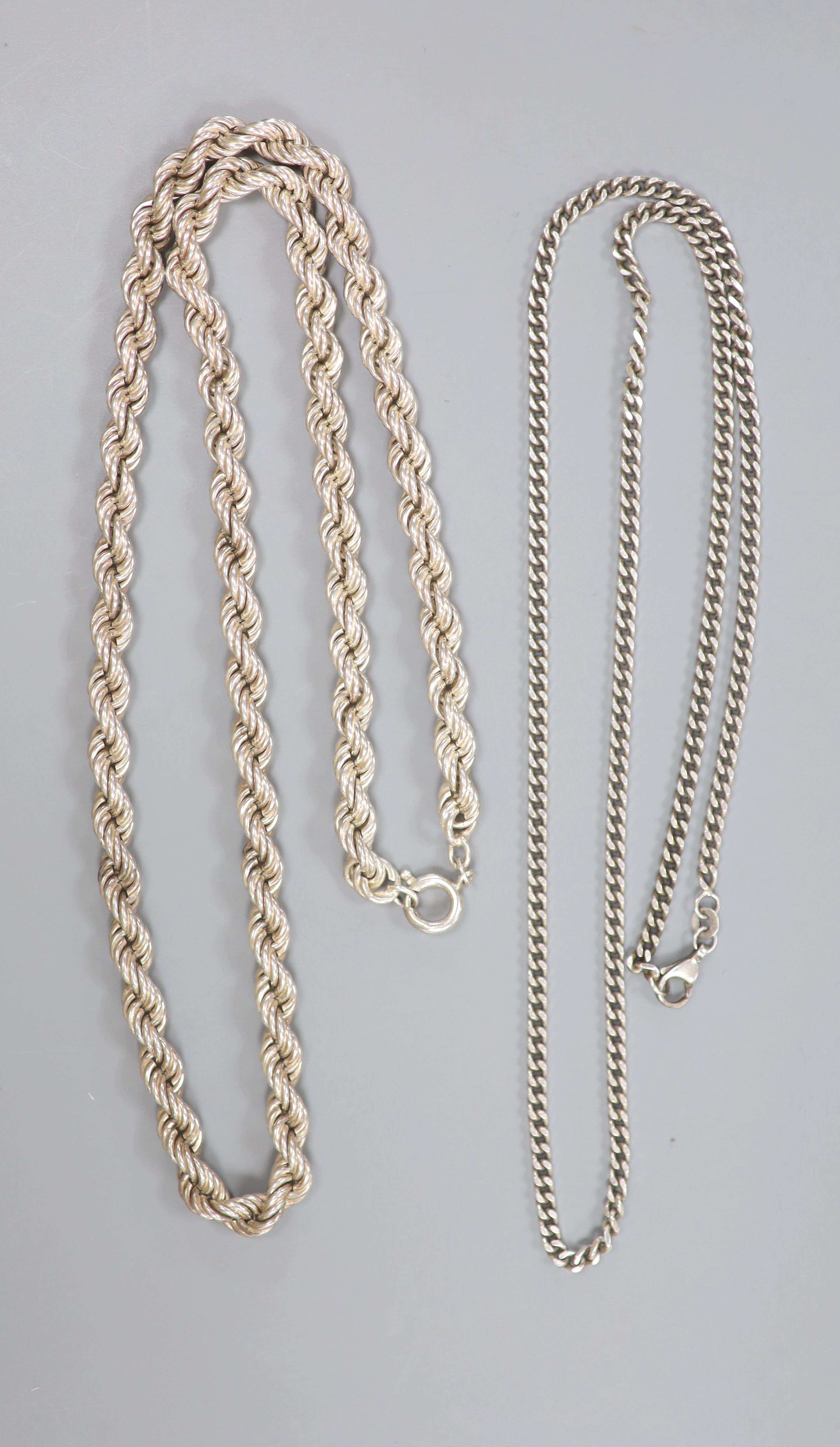 A silver ropetwist chain, 58cm, 75.7 grams and a silver curblink chain, 60cm, 17.7 grams